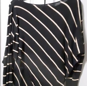 PONCHO STYLE SWEATER.